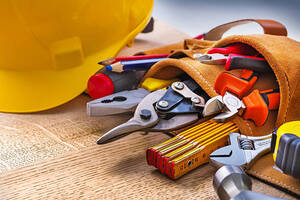 set of construction tools in toolbelt close up on wooden board 692424129bd656f170ade083cd474bab Gettyimages 474975834 612x612 3